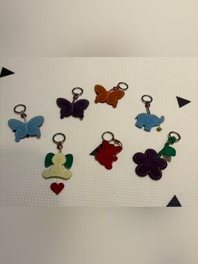 Animals & flower leather Keychains, sold separately. Dallaiti designer, Italy.